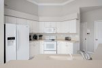 Open Kitchen with White Appliances